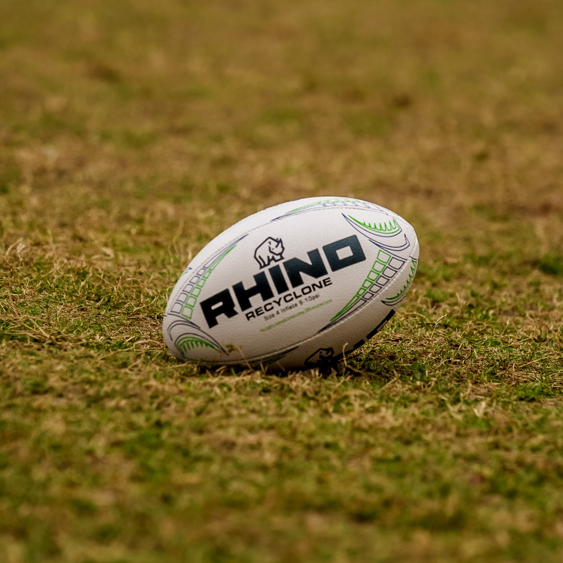 Rhino Recyclone rugby ball on a grass field