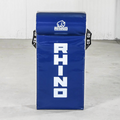 Blue Rhino brand hit shield on a light concrete floor with a white wall background